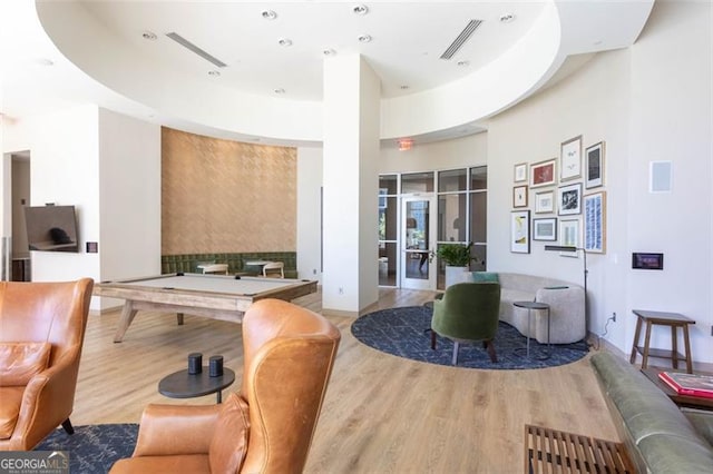 1080 Peachtree St NE Unit 1408, Atlanta, GA 30309 - building lobby featuring a towering ceiling and recessed lighting