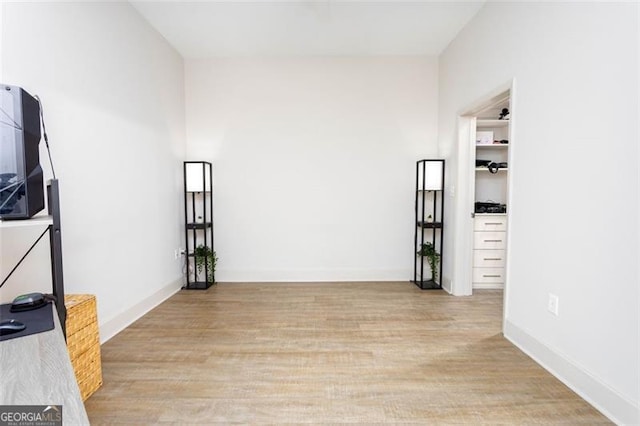 unfurnished room with light hardwood / wood-style floors