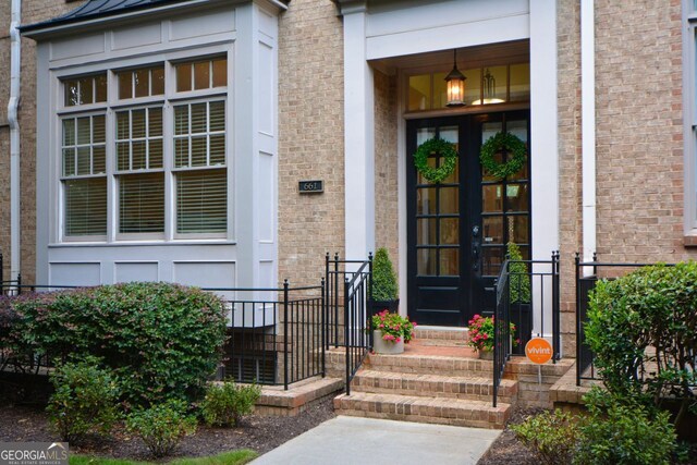 doorway to property featuring french doors