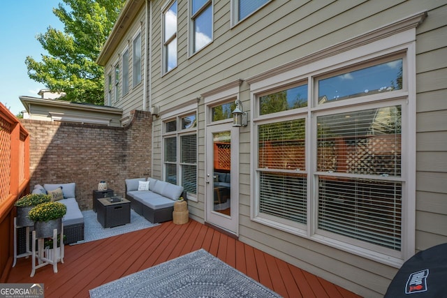 wooden deck with outdoor lounge area