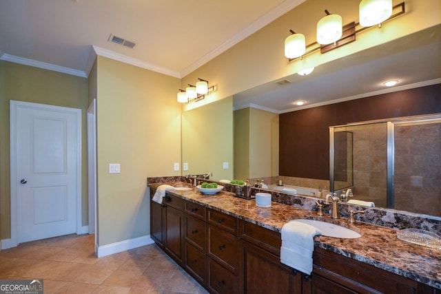 bathroom with vanity, crown molding, and tile patterned floors