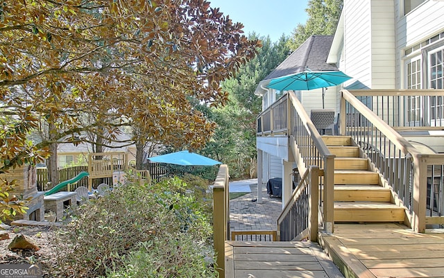 view of yard featuring a wooden deck