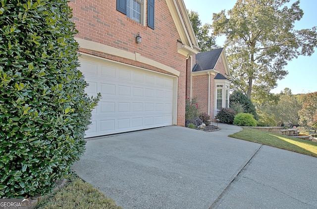 view of property exterior with a garage