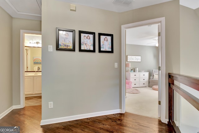 hallway featuring hardwood / wood-style flooring