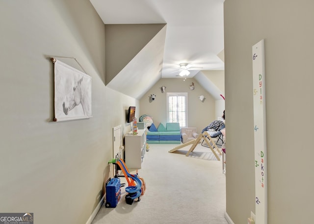 rec room featuring carpet flooring, ceiling fan, and lofted ceiling