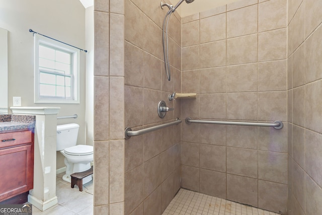 bathroom with tiled shower and toilet