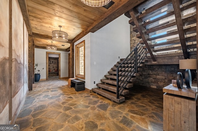 foyer featuring wood ceiling