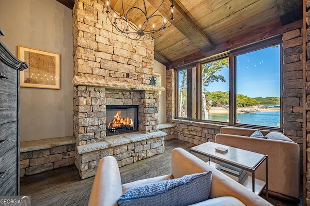 living room with a fireplace, wood ceiling, lofted ceiling with beams, hardwood / wood-style floors, and a water view