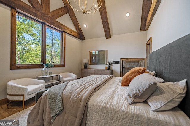 bedroom with a notable chandelier, hardwood / wood-style flooring, beamed ceiling, and high vaulted ceiling