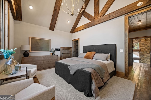 bedroom featuring high vaulted ceiling, beamed ceiling, and a chandelier