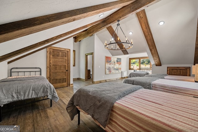 bedroom featuring a chandelier, vaulted ceiling with beams, and hardwood / wood-style flooring