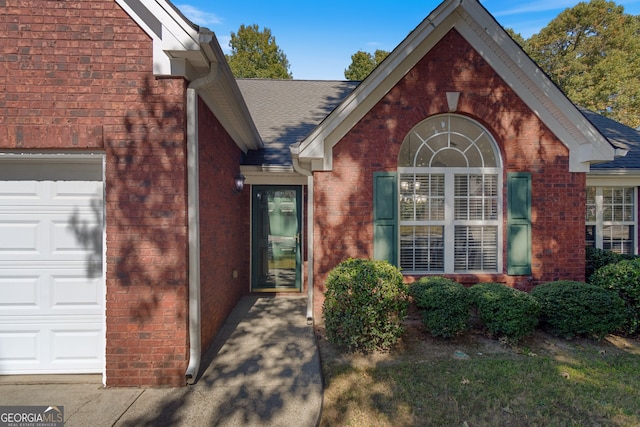 property entrance featuring a garage