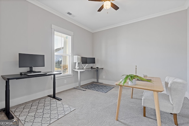 office space featuring carpet floors, ornamental molding, visible vents, and baseboards