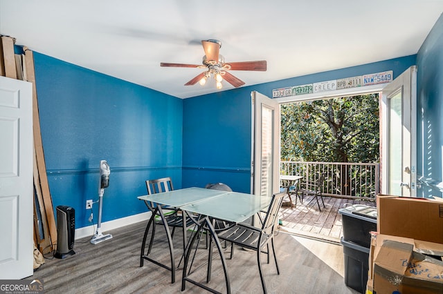 dining room featuring hardwood / wood-style flooring and ceiling fan