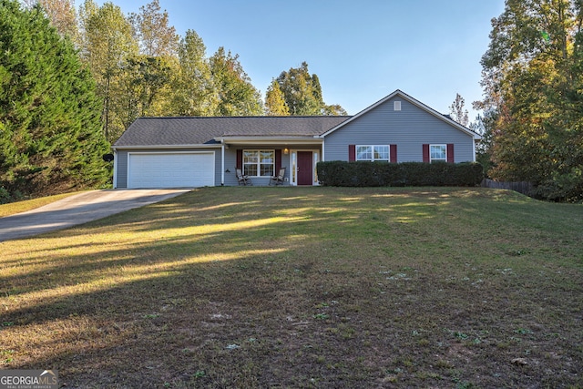 single story home featuring a front yard and a garage