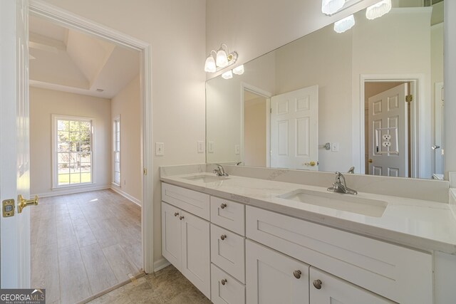 bathroom featuring vanity and hardwood / wood-style flooring