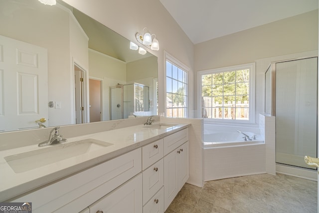 bathroom featuring vanity and separate shower and tub