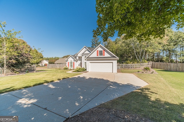 view of front of house with a garage and a front yard