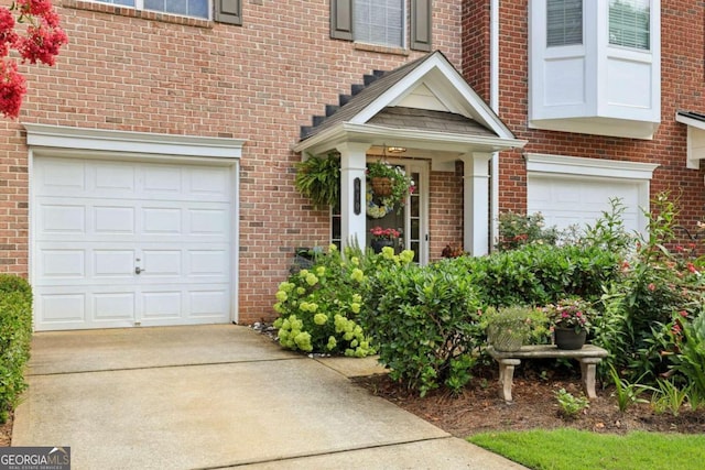 entrance to property featuring a garage