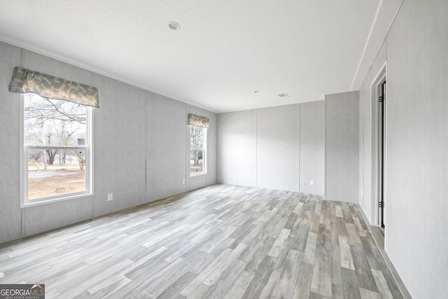 empty room featuring light hardwood / wood-style floors