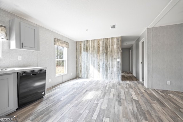 unfurnished living room featuring light wood-type flooring