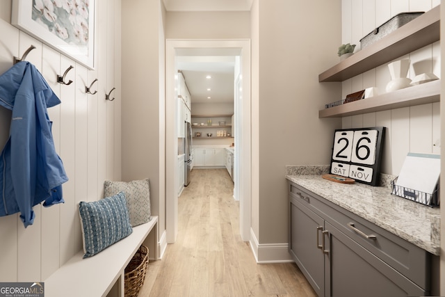 mudroom with light wood-type flooring