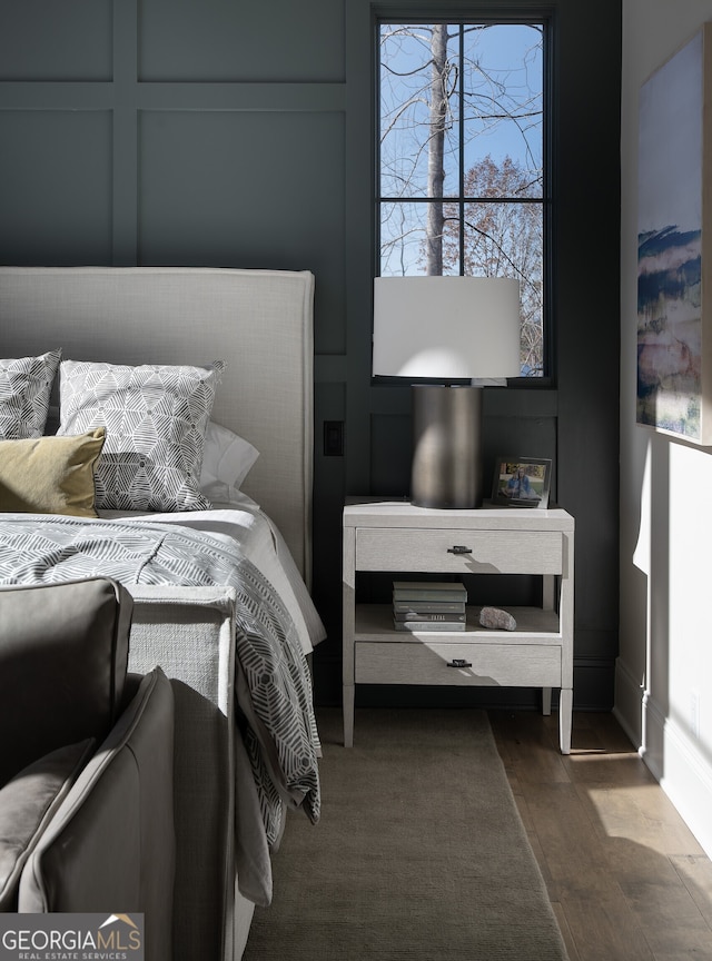 bedroom featuring wood-type flooring