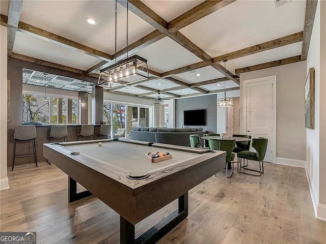 rec room featuring light wood-type flooring, ceiling fan, coffered ceiling, beam ceiling, and billiards