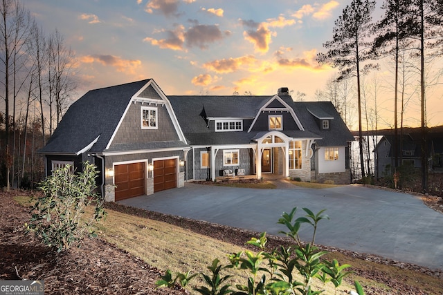 view of front of property with a garage