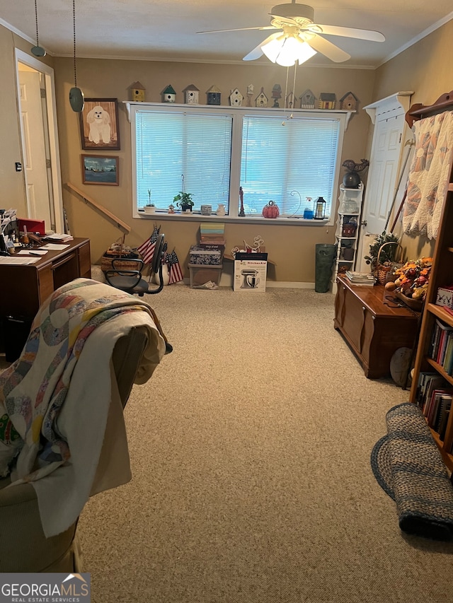 playroom featuring ceiling fan, crown molding, and carpet flooring