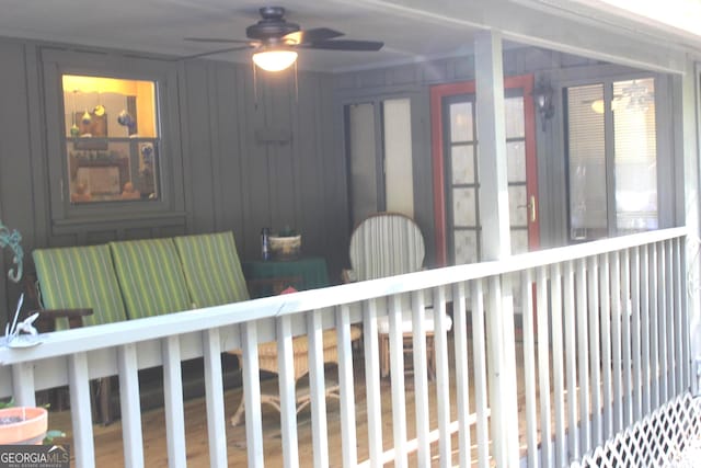 exterior space featuring a ceiling fan