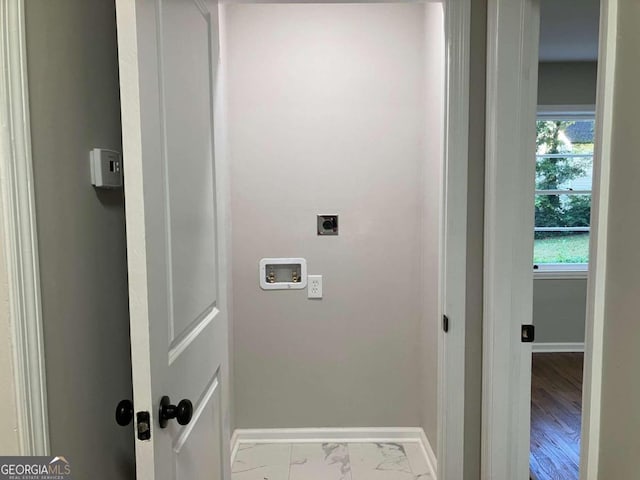 laundry area featuring light hardwood / wood-style flooring, hookup for an electric dryer, and hookup for a washing machine