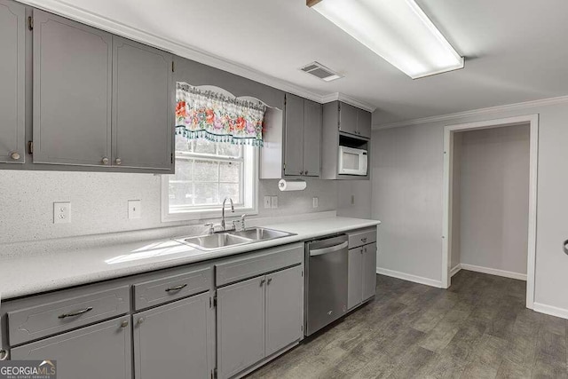 kitchen featuring stainless steel dishwasher, sink, crown molding, and gray cabinets