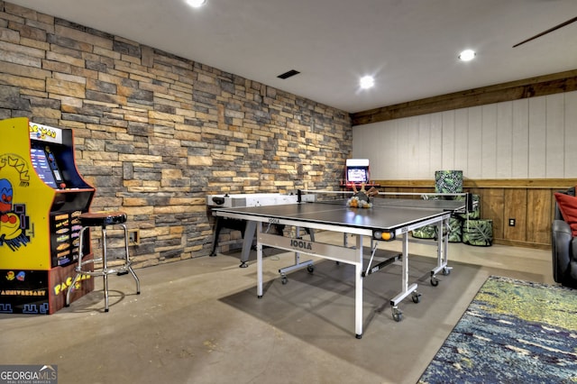 playroom with wooden walls