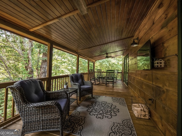 wooden terrace with a porch