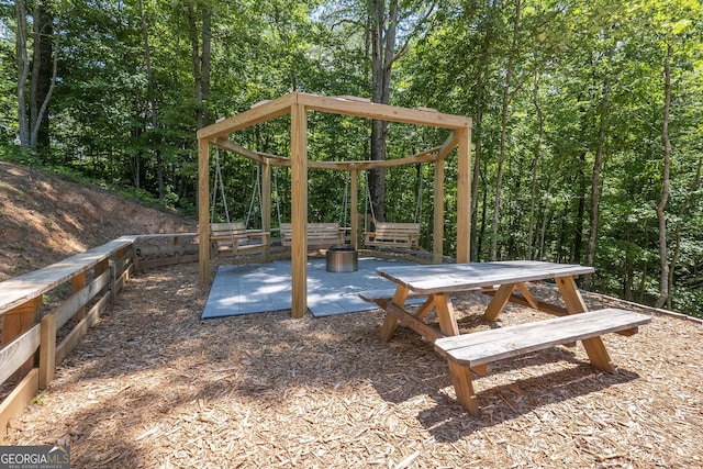 view of community with a patio area