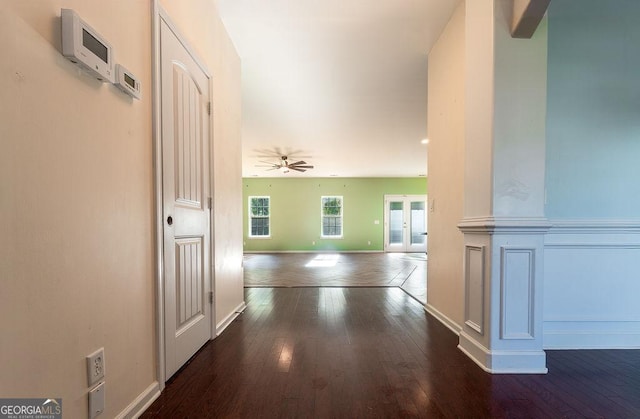 hall featuring french doors and dark hardwood / wood-style floors