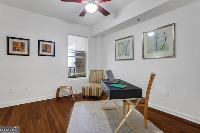 office area featuring ceiling fan and dark hardwood / wood-style floors