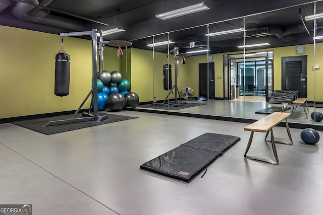 gym featuring concrete floors