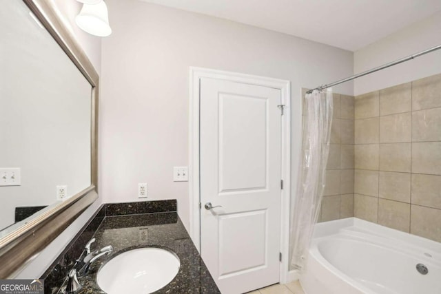 bathroom featuring vanity and shower / bathtub combination with curtain