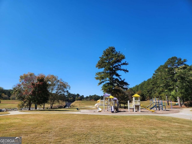 view of play area with a yard