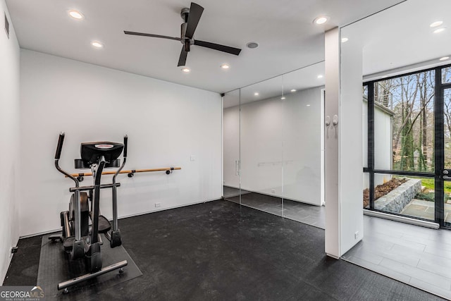 exercise area featuring a ceiling fan and recessed lighting