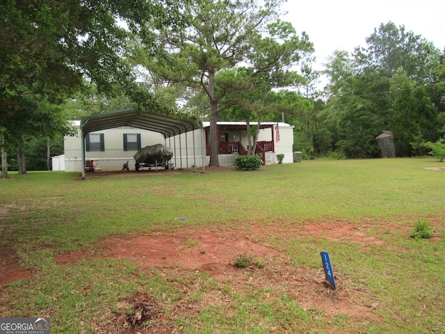 view of yard featuring a carport