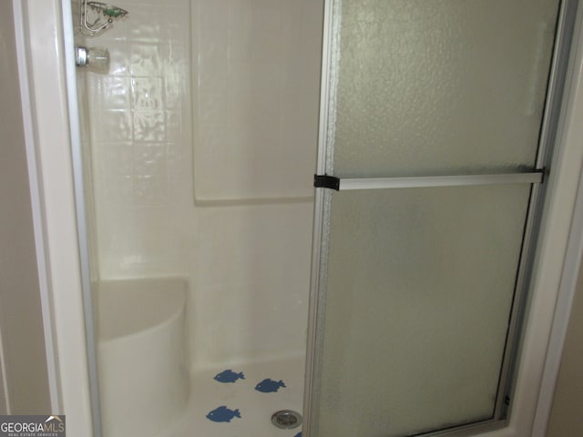 bathroom featuring walk in shower