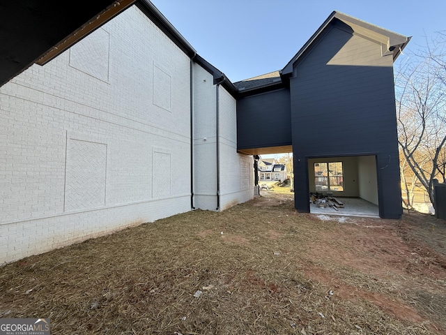 back of house with a patio area