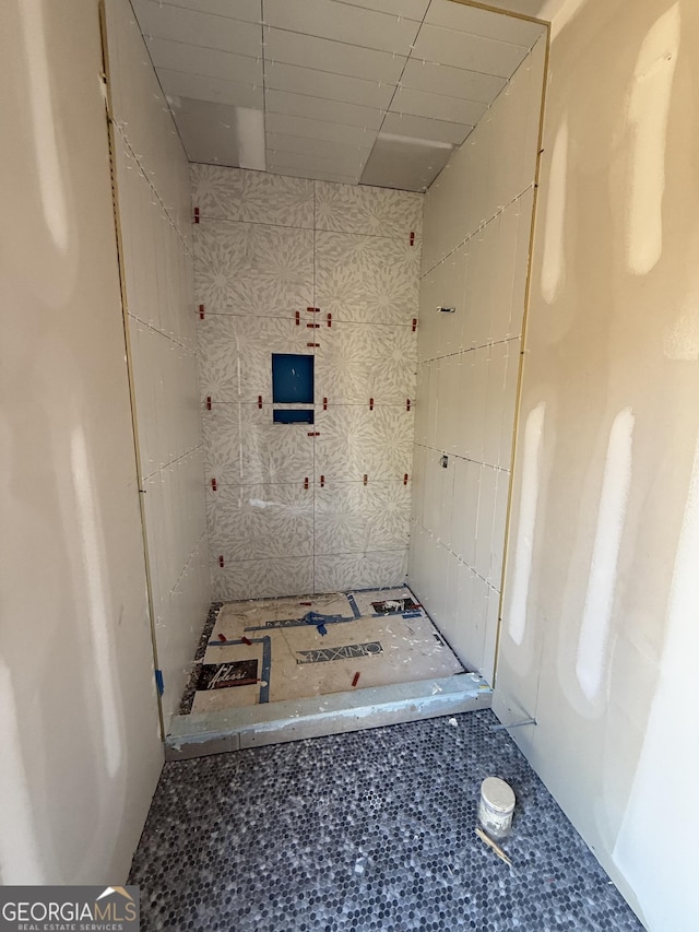 bathroom featuring a paneled ceiling