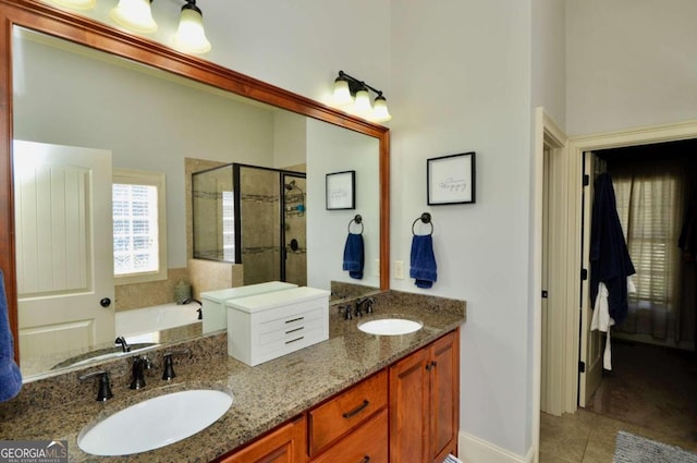 bathroom featuring vanity, shower with separate bathtub, and tile patterned flooring