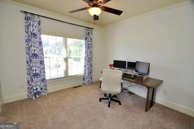 carpeted home office with crown molding and ceiling fan