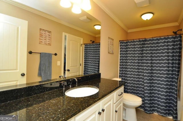 bathroom with vanity, ornamental molding, toilet, and tile patterned floors