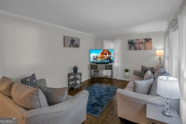 living room with dark hardwood / wood-style flooring and crown molding